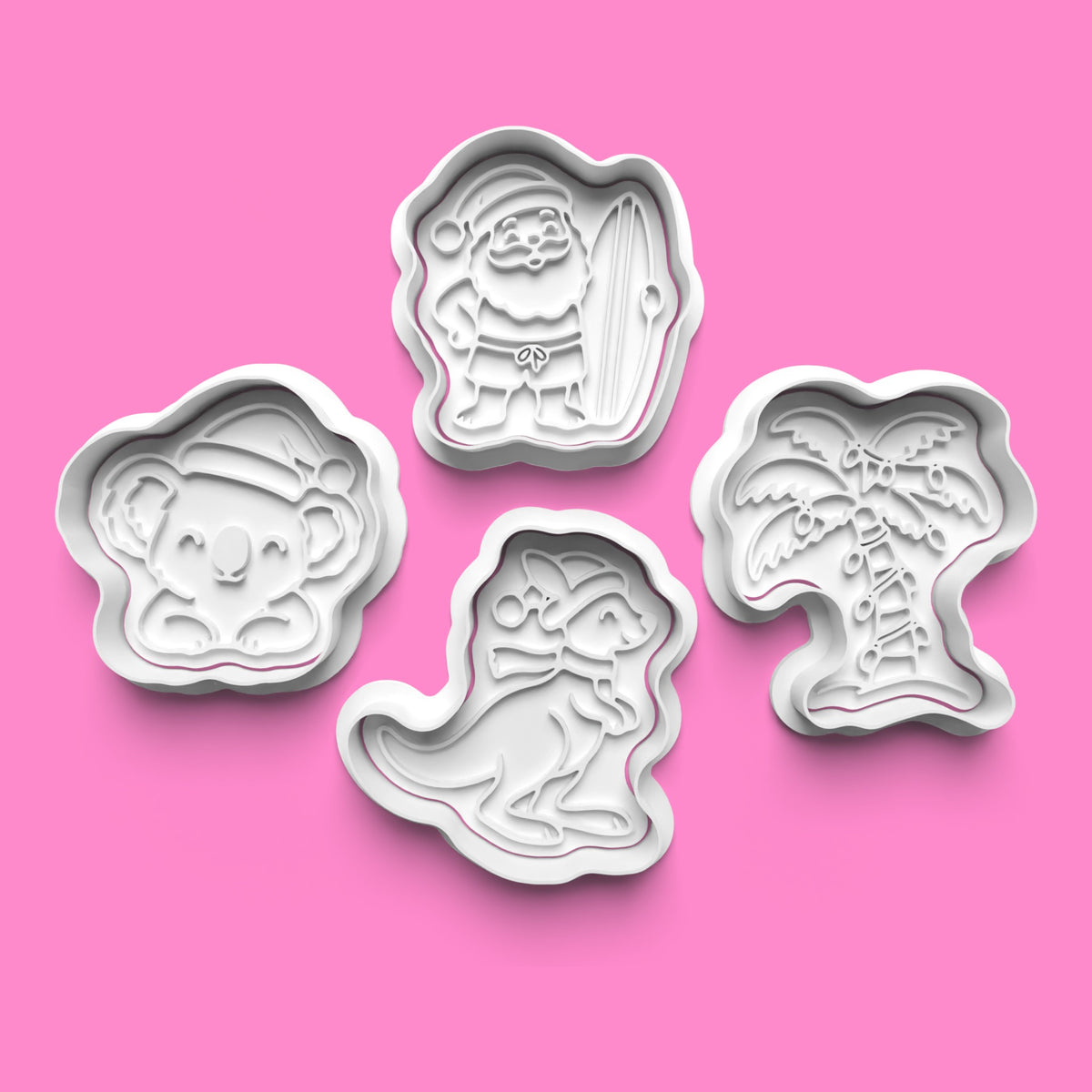 Australian Christmas 4-piece cookie cutter and embosser set featuring surfing Santa with surfboard, Christmas koala, festive kangaroo and decorated palm tree in white 3D printed PLA.