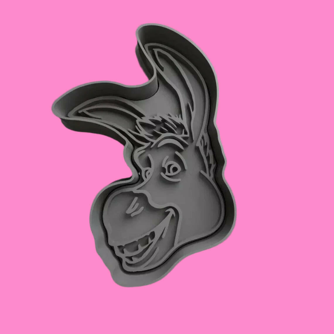Bring the magic of Shrek to your baking with our cookie cutter set, featuring Shrek, Donkey, Fiona, and Gingy designs. Perfect for themed parties and movie nights. Hand wash only.".