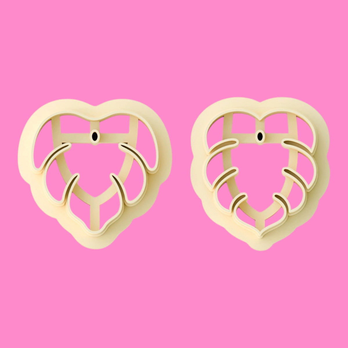 Two-piece layered heart polymer clay cutter set in cream PLA on a pink background, featuring two decorative curved heart designs, available in 20mm to 45mm.