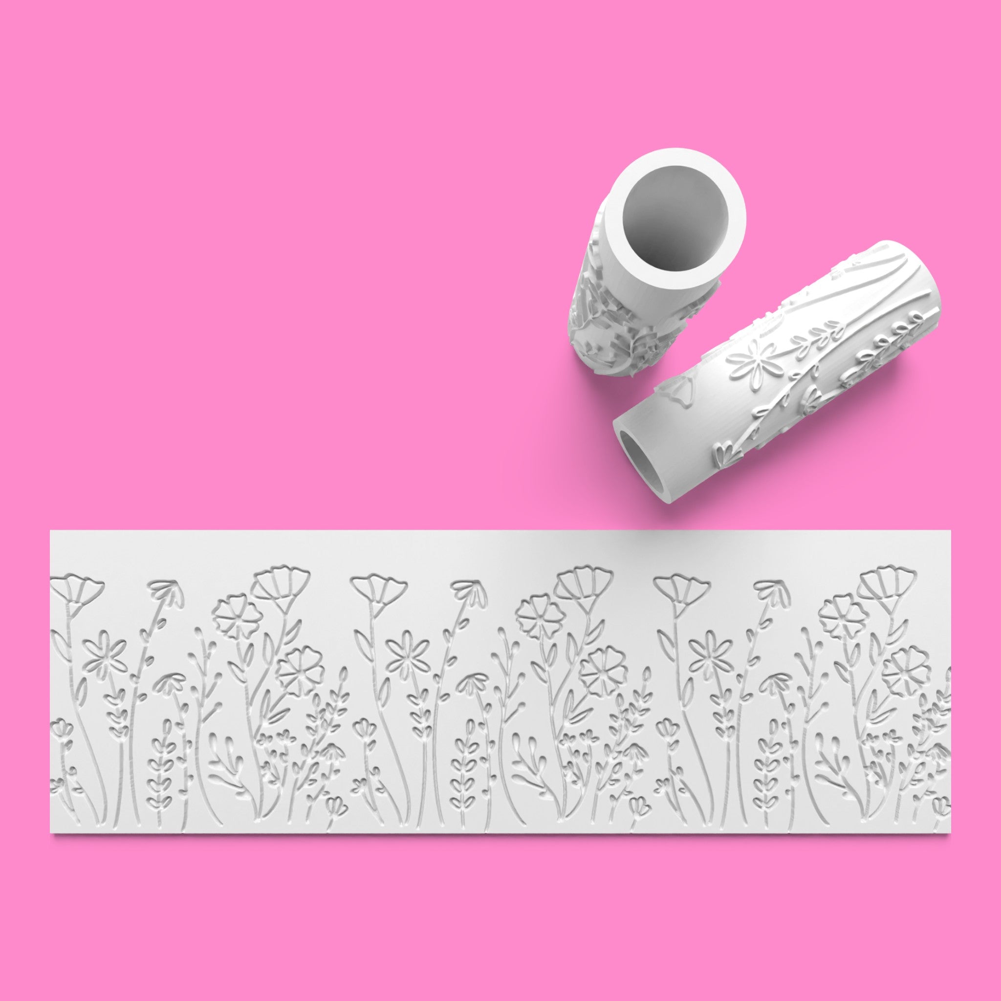 White floral-patterned stencils on a pink background
