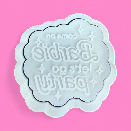 Barbie Lets go party Decorative cookie cutter with text on a pink background