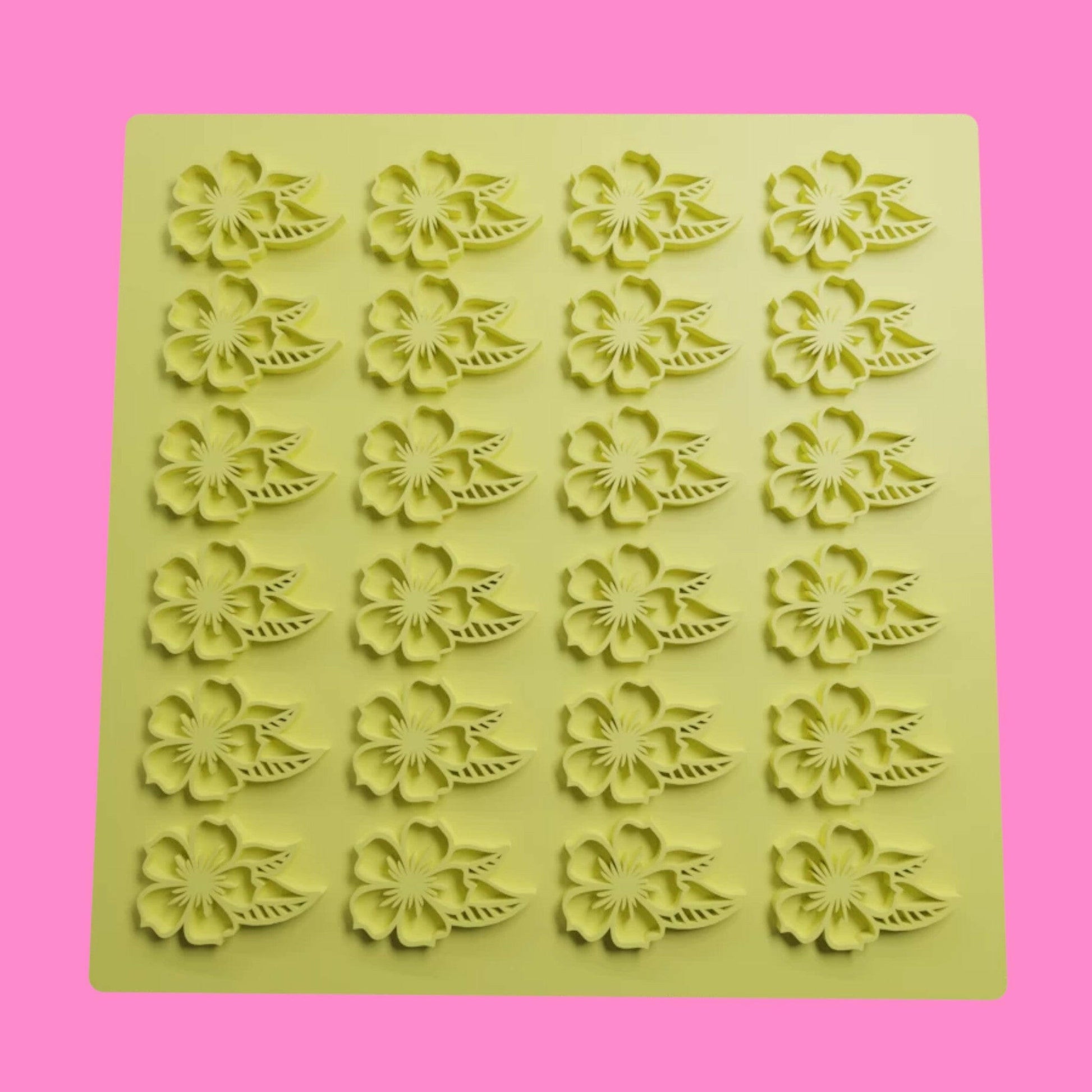 A yellow 3D printed floral textured sheet embosser designed for use with fondant, cookie dough, or clay.