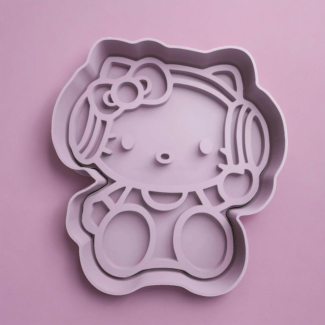 Hello Kitty Cookie Cutter and Embosser Stamp  Complete Set.