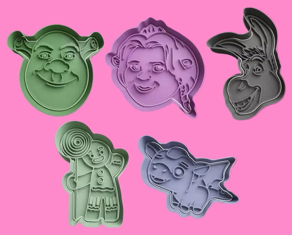 Bring the magic of Shrek to your baking with our cookie cutter set, featuring Shrek, Donkey, Fiona, and Gingy designs. Perfect for themed parties and movie nights. Hand wash only."