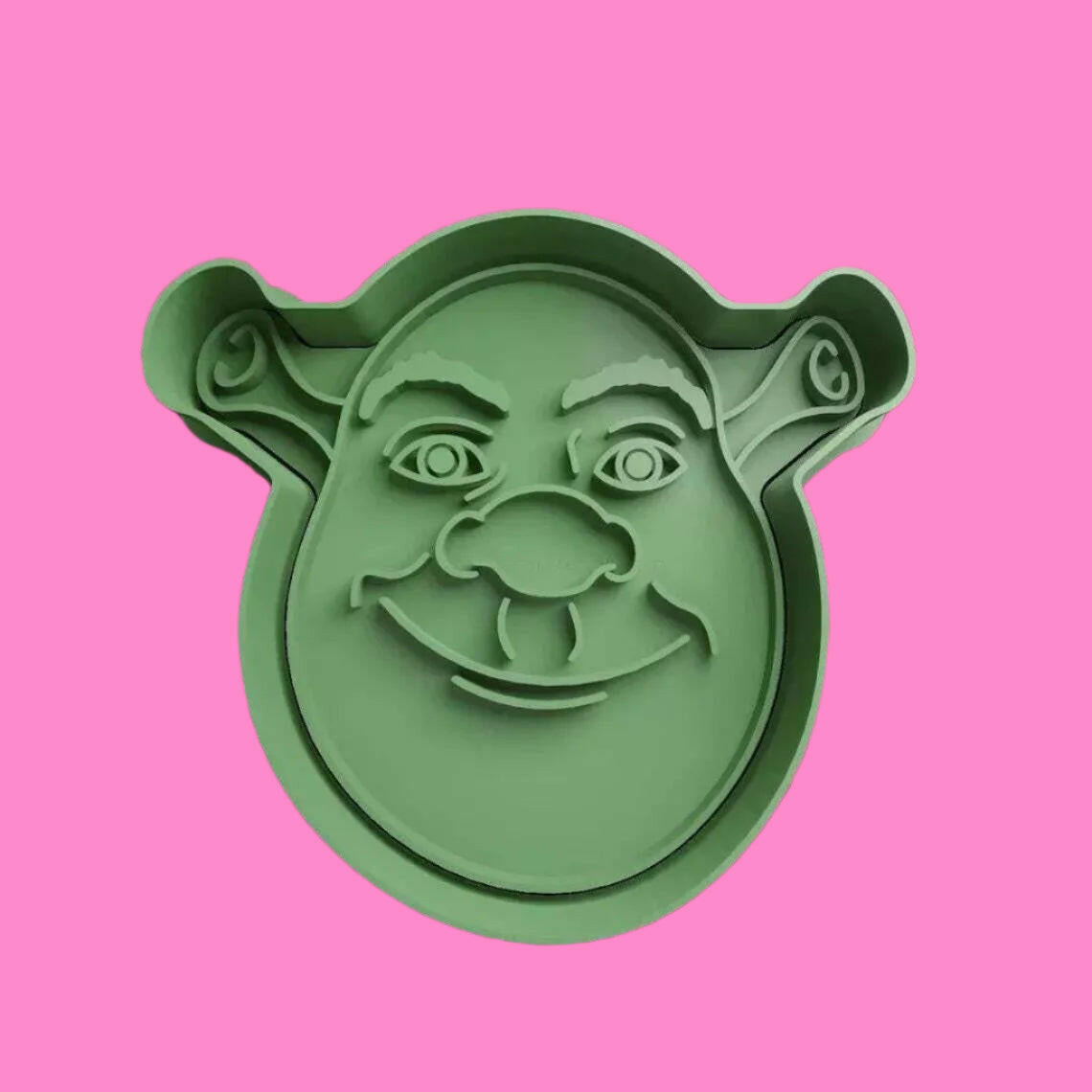 Bring the magic of Shrek to your baking with our cookie cutter set, featuring Shrek, Donkey, Fiona, and Gingy designs. Perfect for themed parties and movie nights. Hand wash only.".