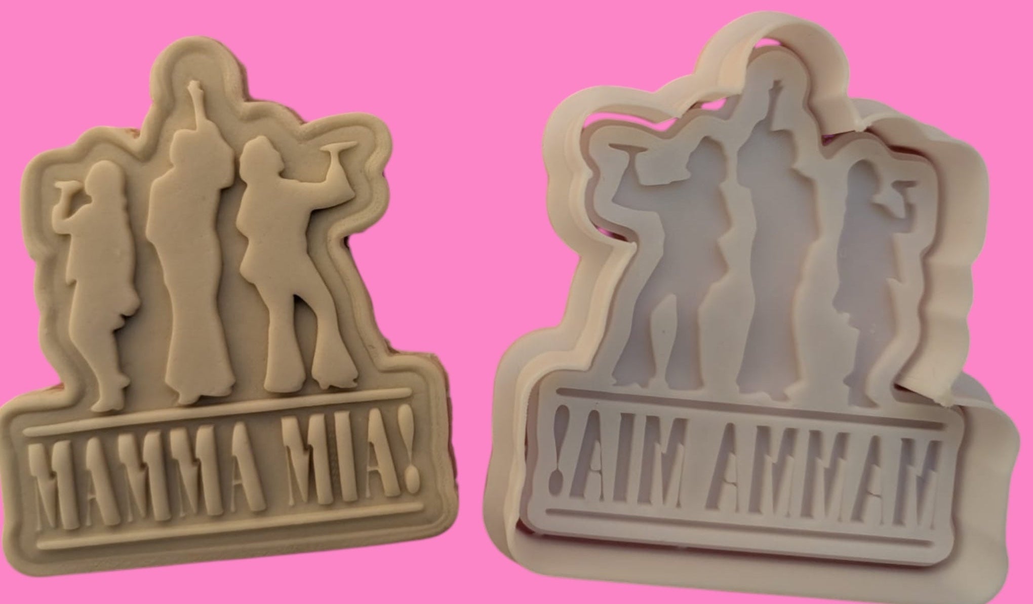 Two plastic cookie cutters in the shape of silhouettes from the musical 'Mamma Mia!' The first cutter has deeper cut-outs for the characters' bodies, while the second embosser has shallower cut-outs for adding detail. Both are displayed against a pink background.