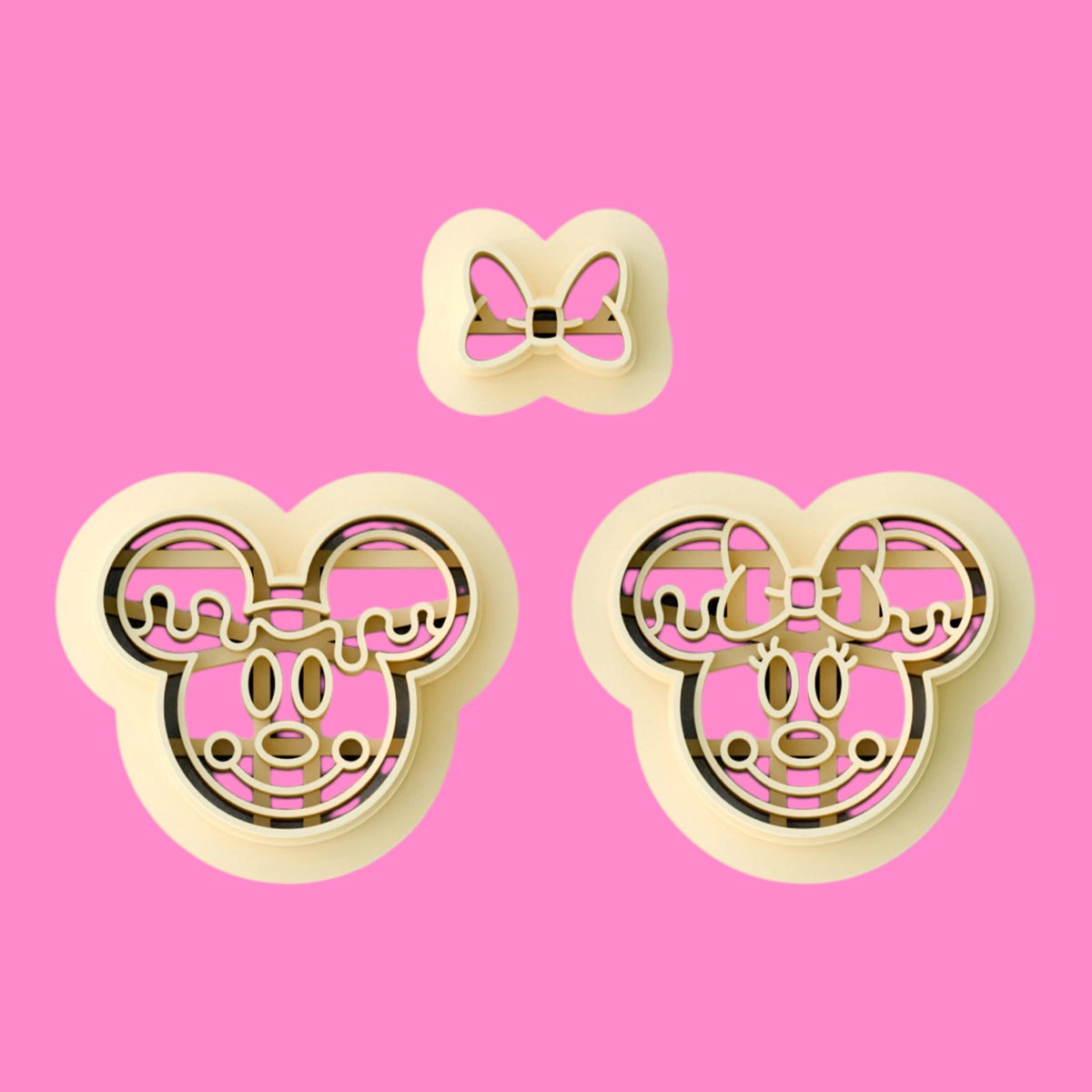 Three-piece mouse couple polymer clay cutter set featuring two smiling mouse faces and a separate bow cutter.