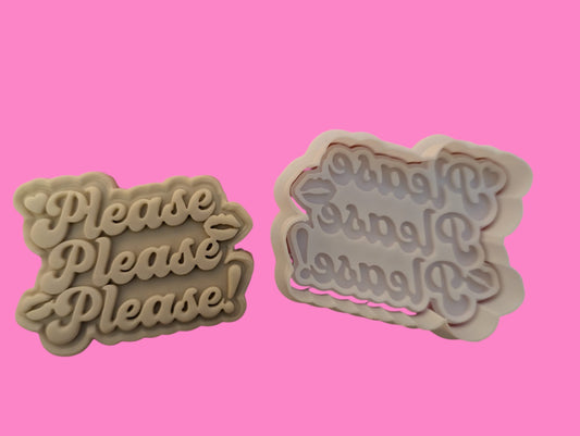 Two cookie cutters with the phrase 'Please Please Please' in different styles, one above the other, on a pink background.