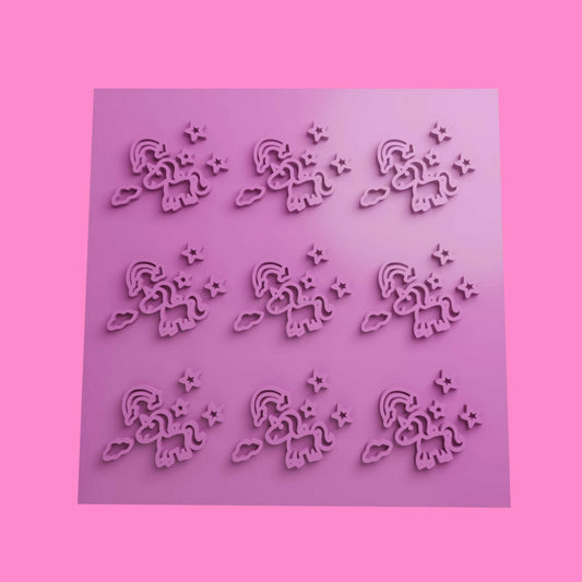 A  3D printed sheet with unicorn textured designs for embossing or outbossing, intended for use on fondant, cookie dough, or clay.
