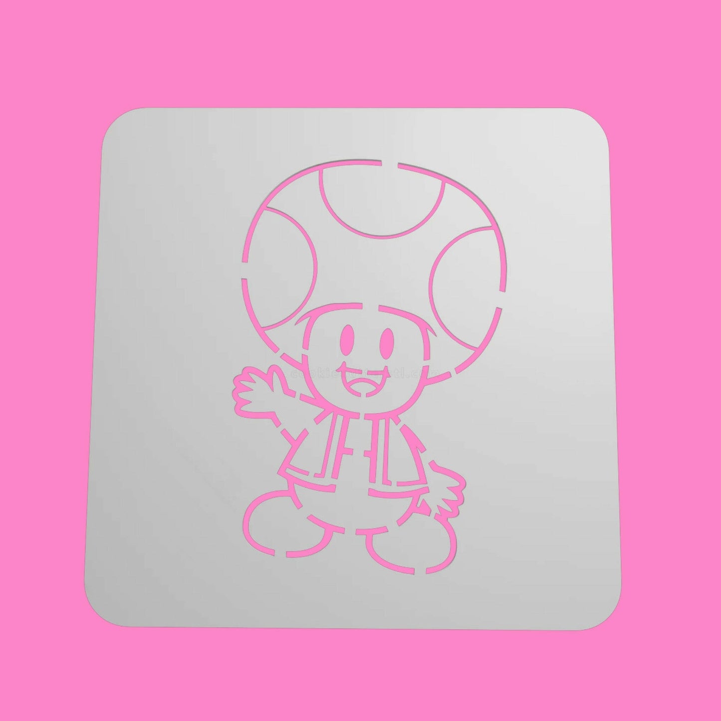 A white square food-safe PLA stencil with a character design of Toad from Super Mario, designed for decorating cookies, cakes, and fondant.