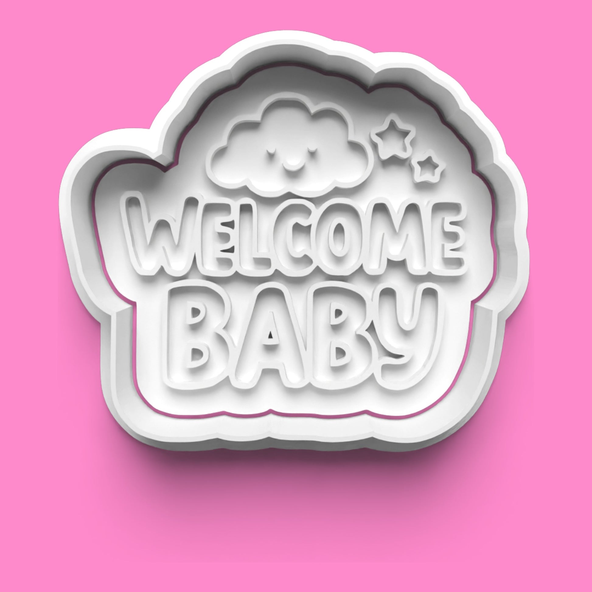 Cookie cutter with 'Welcome Baby' text on a pink background